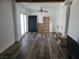 Spacious bedroom with light hardwood floors at 1828 Hassett Ave, Las Vegas, NV 89104