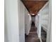 View of hallway with hardwood floors and built-in shelving at 1828 Hassett Ave, Las Vegas, NV 89104