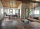 A formal living room with open dining room concept, lots of natural light, wood accents at 1828 Hassett Ave, Las Vegas, NV 89104