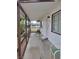 Relaxing covered porch provides shade and entryway to home, with security door for added peace of mind at 1828 Hassett Ave, Las Vegas, NV 89104
