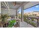 Relaxing balcony with outdoor seating and community views at 8620 Grove Mill Ct, Las Vegas, NV 89139