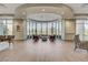 Comfortable lobby area with ample seating, large windows offering views, and elegant decor at 7457 Widewing Dr, North Las Vegas, NV 89084