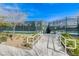 Community tennis court entrance with an accessible ramp and manicured landscaping at 7457 Widewing Dr, North Las Vegas, NV 89084
