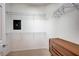 Walk-in closet with wire shelving and a built-in chest of drawers at 7457 Widewing Dr, North Las Vegas, NV 89084