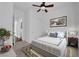 Comfortable bedroom boasts a ceiling fan, and neutral decor at 45 Moltrasio Ln, Henderson, NV 89011