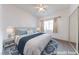 Cozy bedroom with a comfortable bed, ceiling fan, and closet at 1200 Golf Club Dr, Laughlin, NV 89029