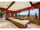 Custom bar area with granite countertops and picturesque views of the valley at 1309 Imperia Dr, Henderson, NV 89052