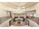 Grand foyer with a soaring ceiling, elegant chandelier, and ornate iron railing at 1309 Imperia Dr, Henderson, NV 89052