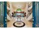 Impressive foyer with a grand staircase, marble floors, and designer details at 1309 Imperia Dr, Henderson, NV 89052