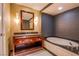Modern bathroom featuring a dual sink vanity with soaking tub and recessed lights at 2700 Las Vegas Blvd # 2702, Las Vegas, NV 89109