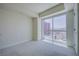 Bright bedroom with carpet and a large window with city views at 2700 Las Vegas Blvd # 2702, Las Vegas, NV 89109