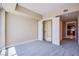 Bright bedroom with plush carpeting and spacious closet, creating a cozy and organized space at 2700 Las Vegas Blvd # 2702, Las Vegas, NV 89109