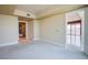 Bedroom with neutral carpet, doorway and an open view into living space at 2700 Las Vegas Blvd # 2702, Las Vegas, NV 89109