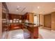 Chef's kitchen with stainless steel appliances, granite countertops, and a spacious island at 2700 Las Vegas Blvd # 2702, Las Vegas, NV 89109
