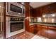 Gourmet kitchen with high-end stainless steel appliances, custom cabinetry and granite countertops at 2700 Las Vegas Blvd # 2702, Las Vegas, NV 89109