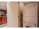 Efficient laundry area with stacked washer and dryer, maximizing space and convenience at 2700 Las Vegas Blvd # 2702, Las Vegas, NV 89109