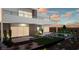 Beautiful backyard featuring a modern pool, integrated fire pit, and sleek patio at 25 Canyon Bay Dr, Henderson, NV 89011
