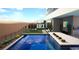 Backyard paradise featuring a sparkling pool, spa, fire pit, desert plants and desert views at 25 Canyon Bay Dr, Henderson, NV 89011