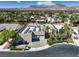 Contemporary home featuring solar panels, desert landscaping, and four-car garage at 2017 Slow Wind St, Las Vegas, NV 89134