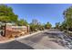 Desert Trails community entrance with desert landscaping and gated access at 2017 Slow Wind St, Las Vegas, NV 89134