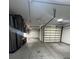 Four car garage with ceiling fan and ample storage space at 2017 Slow Wind St, Las Vegas, NV 89134