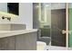 Contemporary bathroom boasting marble accents, vessel sink, and luxurious glass-enclosed shower at 8780 Haven St, Las Vegas, NV 89123