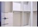 Bright walk-in closet featuring built-in shelving and drawers for optimal storage solutions at 8780 Haven St, Las Vegas, NV 89123