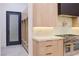 Modern kitchen features light wood cabinetry, stainless steel appliances, and white marble countertops at 8780 Haven St, Las Vegas, NV 89123