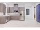 Sleek kitchen features stainless steel appliances, quartz counters, and modern cabinetry at 8780 Haven St, Las Vegas, NV 89123