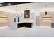 Spacious modern kitchen featuring a large island with marble countertop and unique pendant lighting at 8780 Haven St, Las Vegas, NV 89123