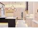 Modern kitchen featuring custom cabinetry, state-of-the-art appliances, and a large center island at 8780 Haven St, Las Vegas, NV 89123