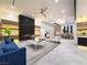 Bright, modern living room featuring a sleek fireplace, contemporary furniture, and stylish decor at 8780 Haven St, Las Vegas, NV 89123