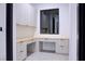 Bright home office featuring custom built-in desks, cabinets, shelving, and modern finishes at 8780 Haven St, Las Vegas, NV 89123