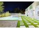 Backyard features a luxurious pool, manicured landscaping, and seamless indoor-outdoor living at 8780 Haven St, Las Vegas, NV 89123