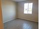 Bright bedroom with neutral walls and tile flooring at 4761 E Sandalwood Dr, Pahrump, NV 89061