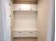 Laundry room with built-in storage and cabinets at 4761 E Sandalwood Dr, Pahrump, NV 89061