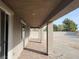 Covered patio with brick pavers and access to backyard at 4761 E Sandalwood Dr, Pahrump, NV 89061