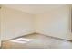 A bright bedroom with carpet and natural light at 5701 Pearldrop Ave, Las Vegas, NV 89107