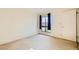 Bedroom with a bright window at 5701 Pearldrop Ave, Las Vegas, NV 89107