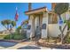 Welcoming community entrance showcasing a manicured walkway, lush landscaping, and a decorative monument sign at 5701 Pearldrop Ave, Las Vegas, NV 89107