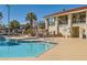 Resort-style pool with a spa, clean tilework, and access to community amenities for residents' enjoyment at 5701 Pearldrop Ave, Las Vegas, NV 89107
