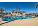 Well-maintained community pool area with clear blue water, ideal for relaxation and recreation under the sun at 5701 Pearldrop Ave, Las Vegas, NV 89107
