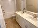 Bathroom boasts double vanity, bathtub, and shower at 9902 Belikove Manor Ave, Las Vegas, NV 89178