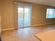Bright dining area with sliding door access to backyard patio at 9902 Belikove Manor Ave, Las Vegas, NV 89178