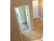 Upstairs hallway with view into bedroom and door at 9902 Belikove Manor Ave, Las Vegas, NV 89178