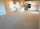 Modern kitchen with island and stainless steel appliances at 9902 Belikove Manor Ave, Las Vegas, NV 89178