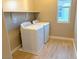 Convenient laundry room with washer and dryer at 9902 Belikove Manor Ave, Las Vegas, NV 89178