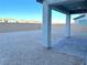 Covered patio with pavers and view of backyard at 9902 Belikove Manor Ave, Las Vegas, NV 89178