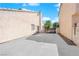 Backyard with concrete patio and access gate at 3936 Rhine Way, Las Vegas, NV 89108