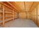 Unfinished storage room with wooden shelves at 3936 Rhine Way, Las Vegas, NV 89108